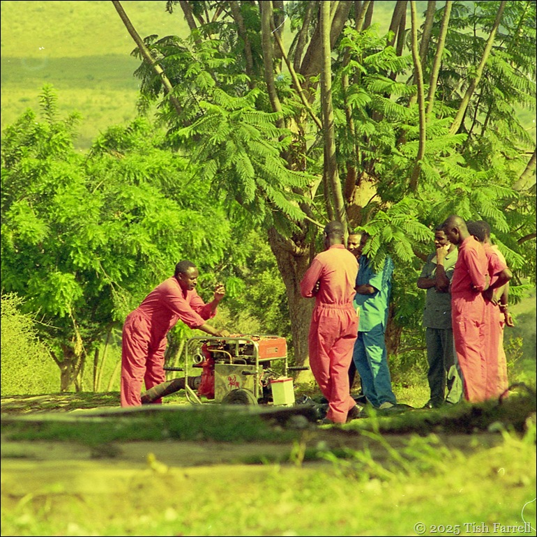 Taita Hills men in red Taita Hills men in red